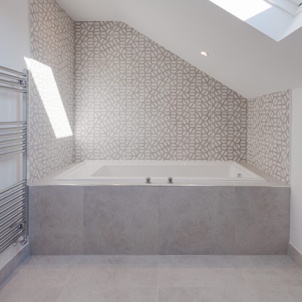 family bathroom renovation in Ewell with geometric tiles