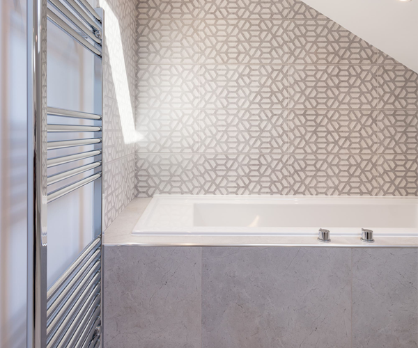 family bathroom renovation in Ewell with geometric tiles